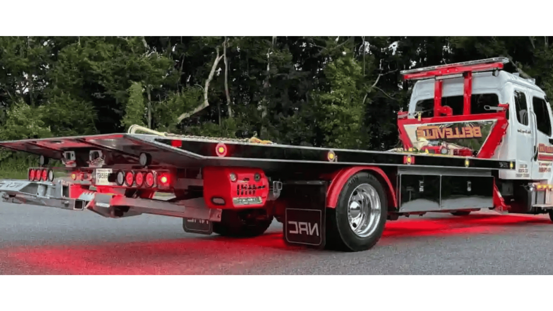 20tb NRC Carrier with Chrome hubcap covers, red underglow and stainless trim