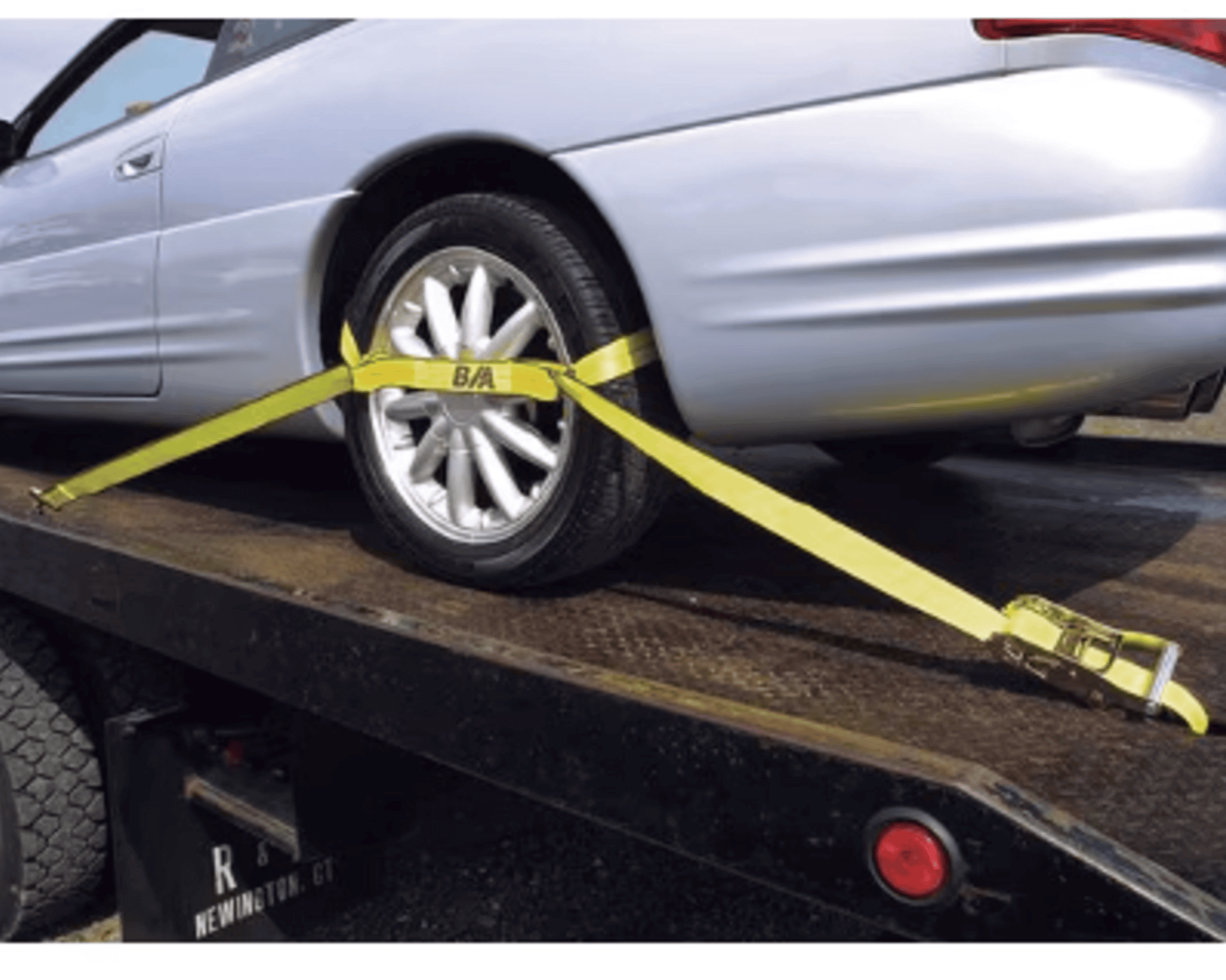 8 point tie down strapped around a tire - towing