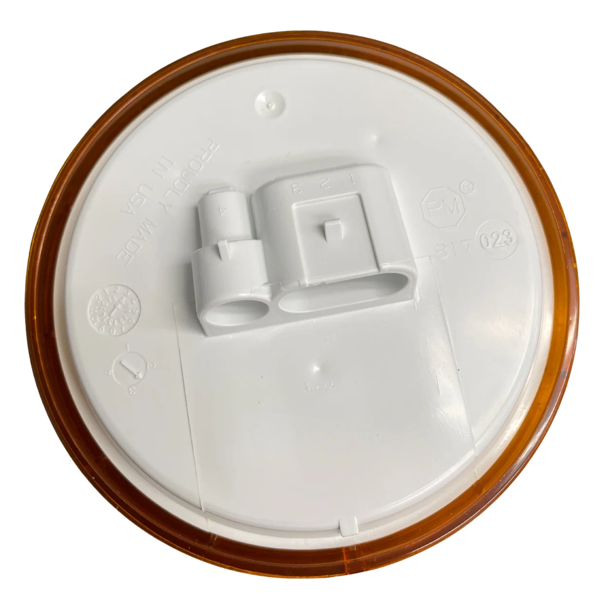 Bottom view of Peterson 817A36 amber LED turn signal light, showing AMP connector and moisture-resistant design.