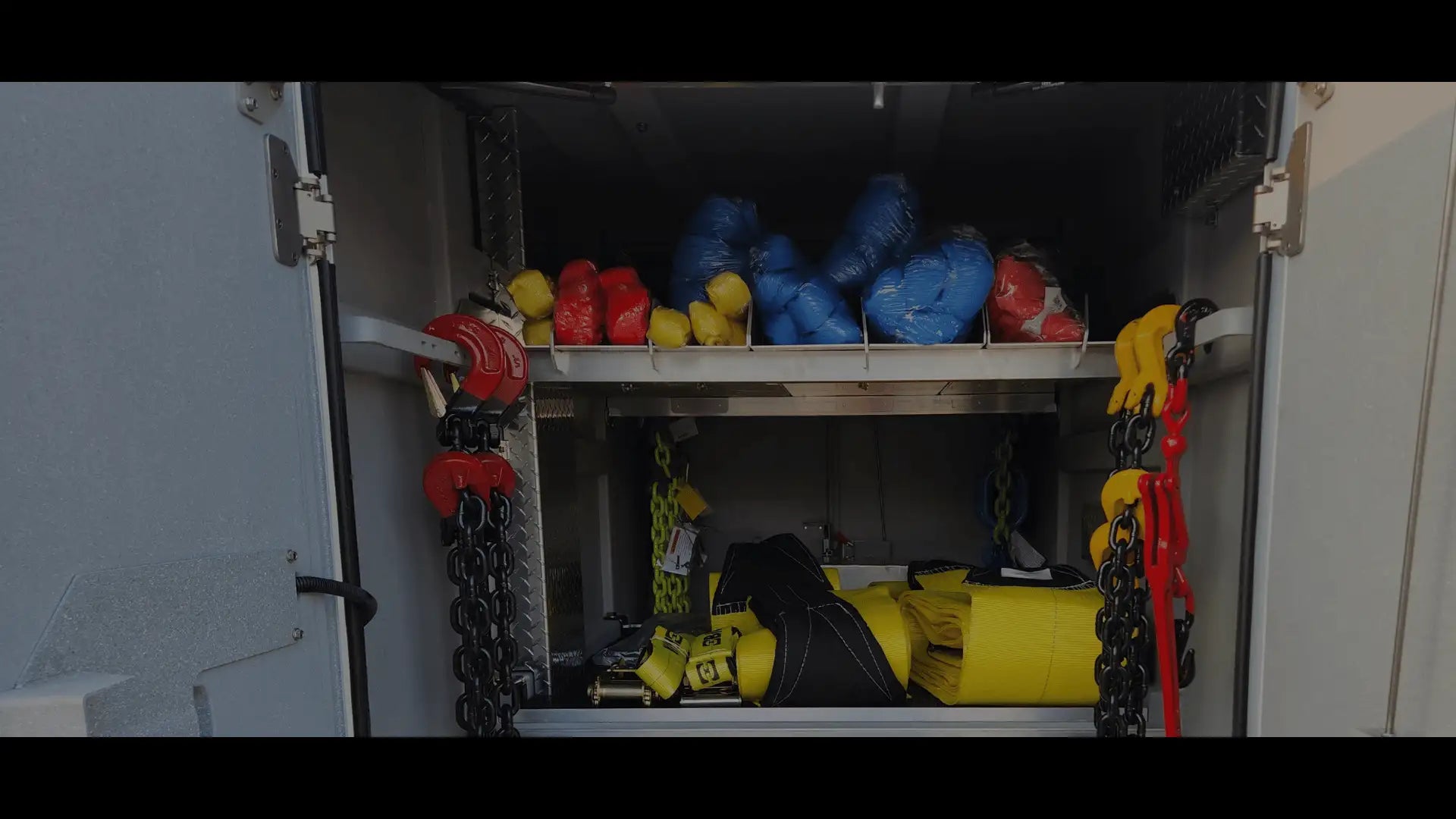 Rigging equipment in tunnel toolbox - round slings, recovery straps, heavy duty chains, ratchet binders