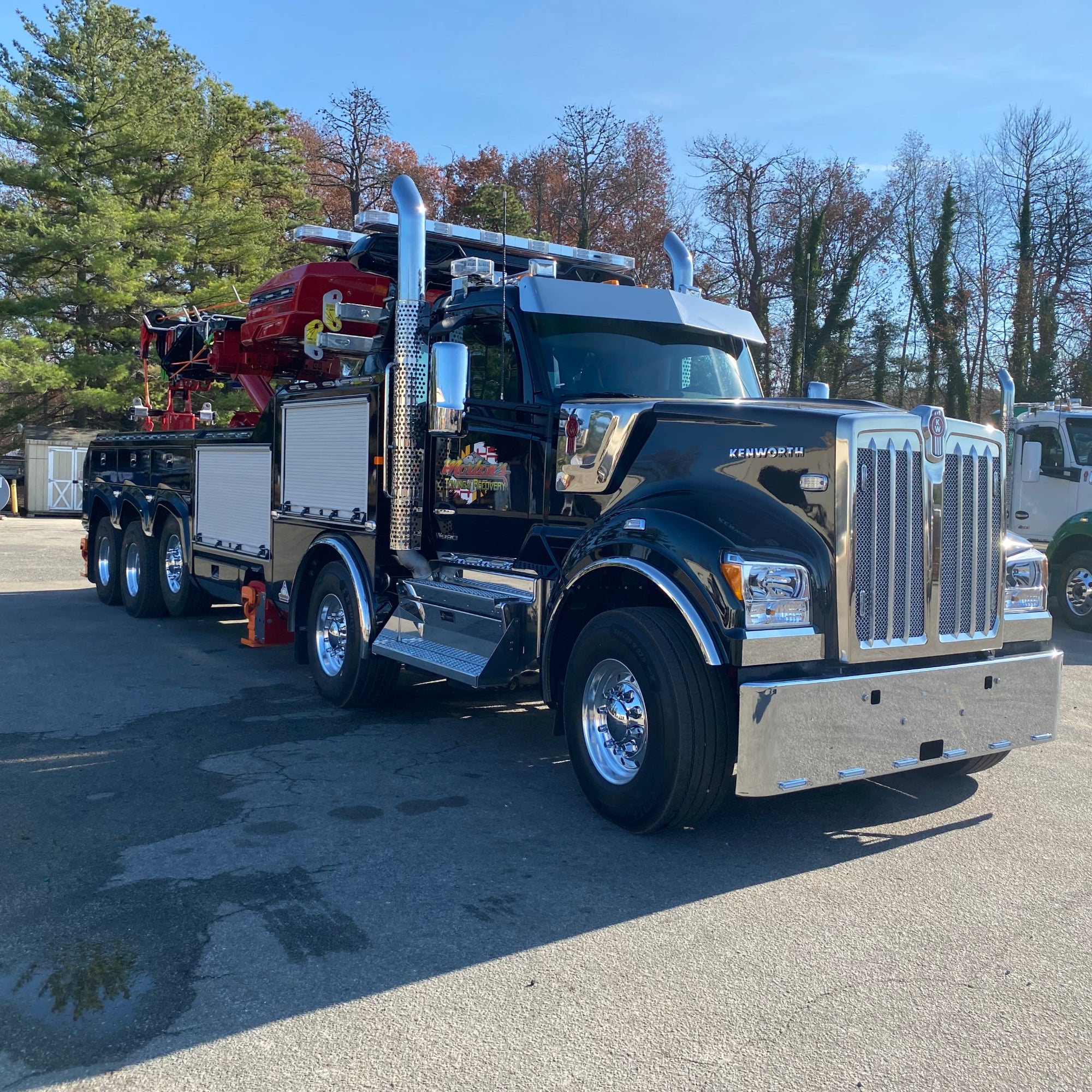NRC black heavy duty wrecker with tunnel toolbox and extendable rotating boom