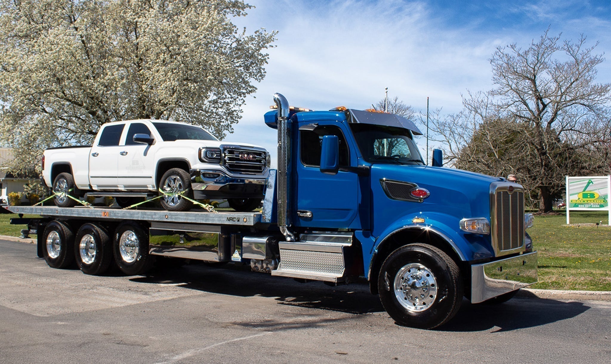 How to Properly Tie Down a Car on a Rollback Tow Truck