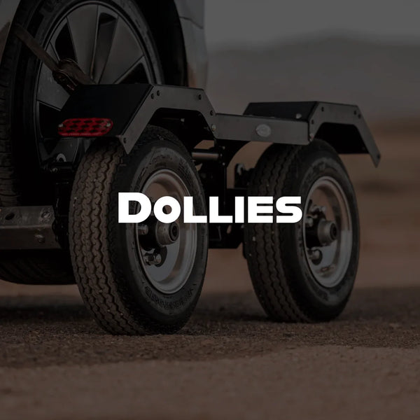 a vehicle strapped to a towing dolly from In the Ditch