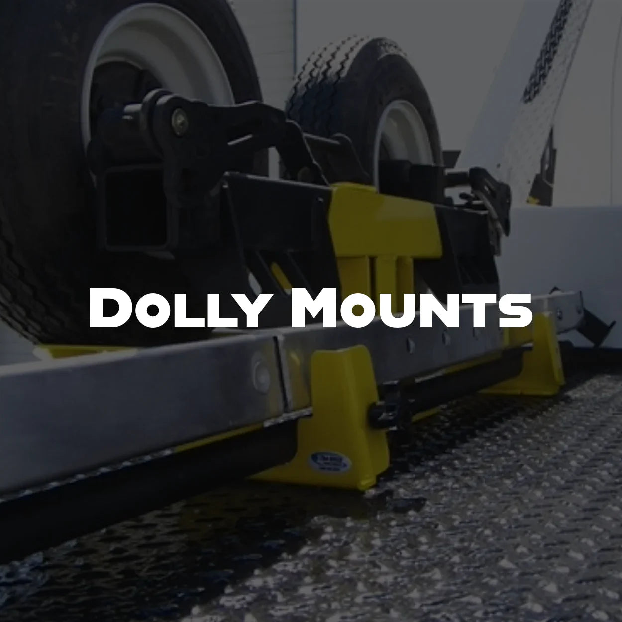 mounts for storing towing dollies on tow trucks