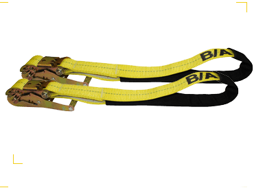 Yellow tie down straps with metal buckles for effective cargo control and secure loading.