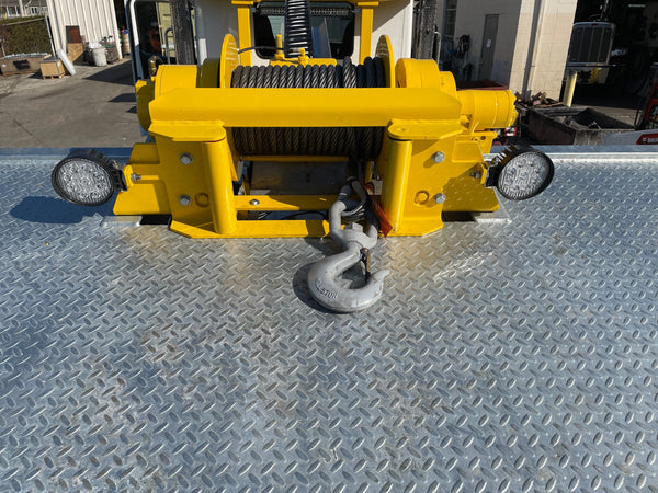 20,000 lbs. Ramsey Winch with Wire Rope on a Carrier Bed