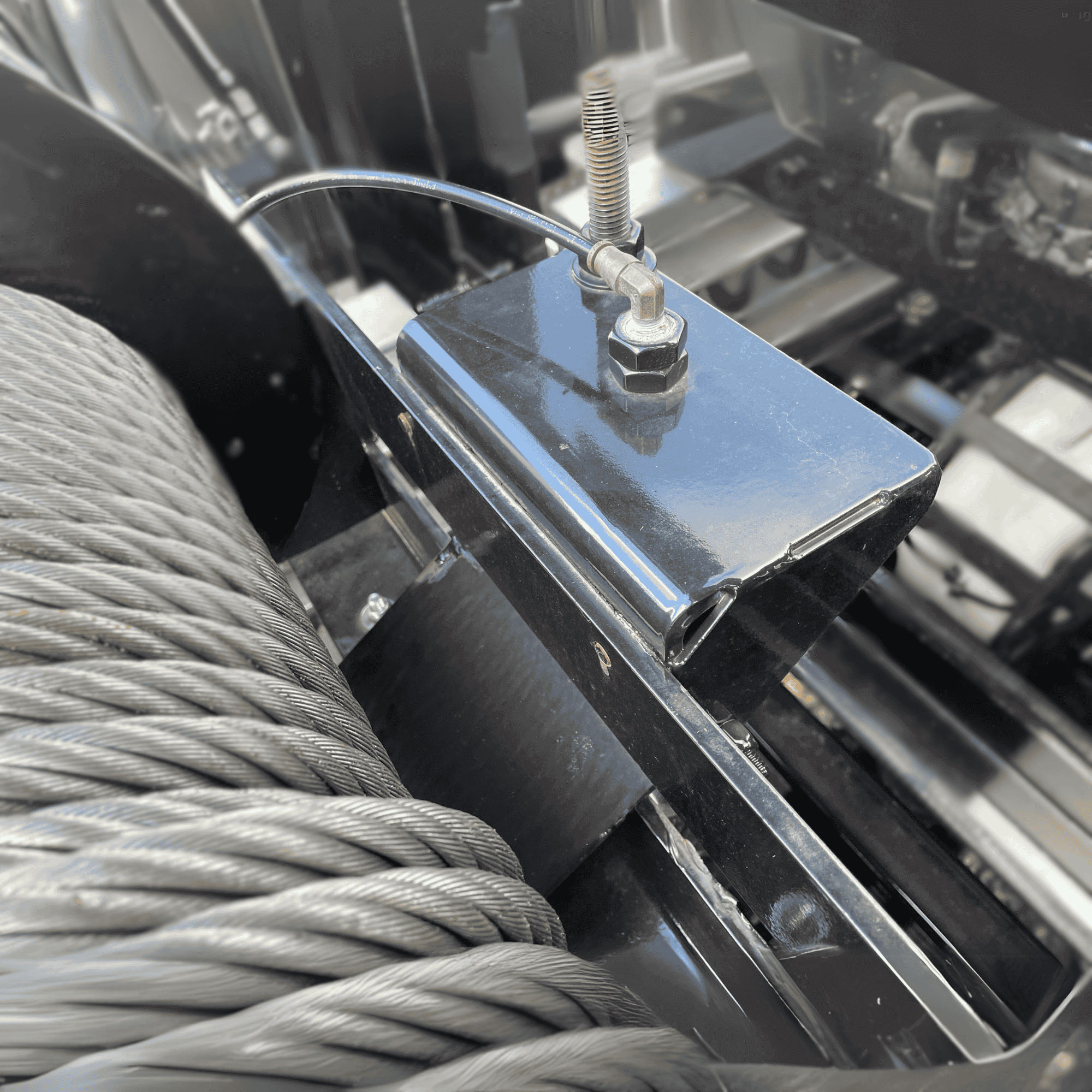 20k air bag winch tensioner assembly installed on a car carrier