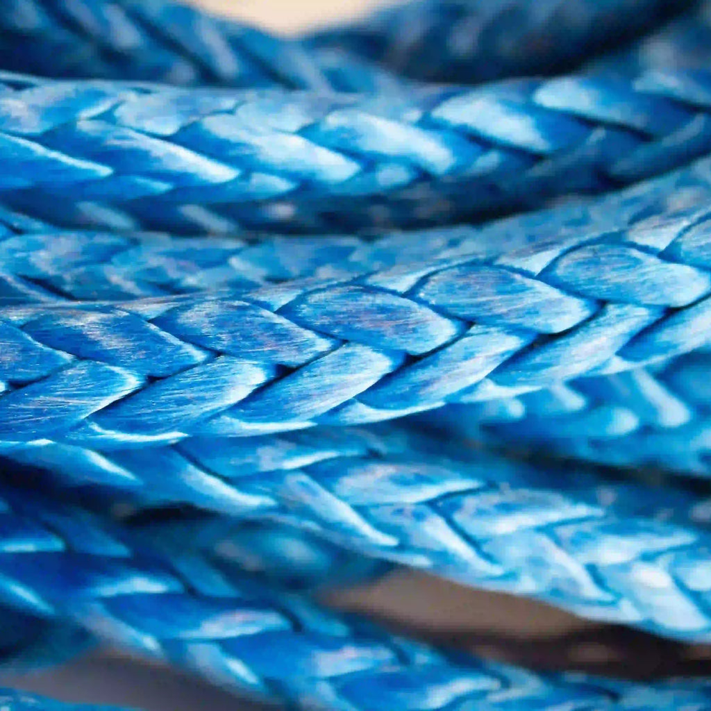 a close up of the self locking hook on a 3/8" x 75' synthetic winch line. Highlights the braided pattern that makes up the rope. 