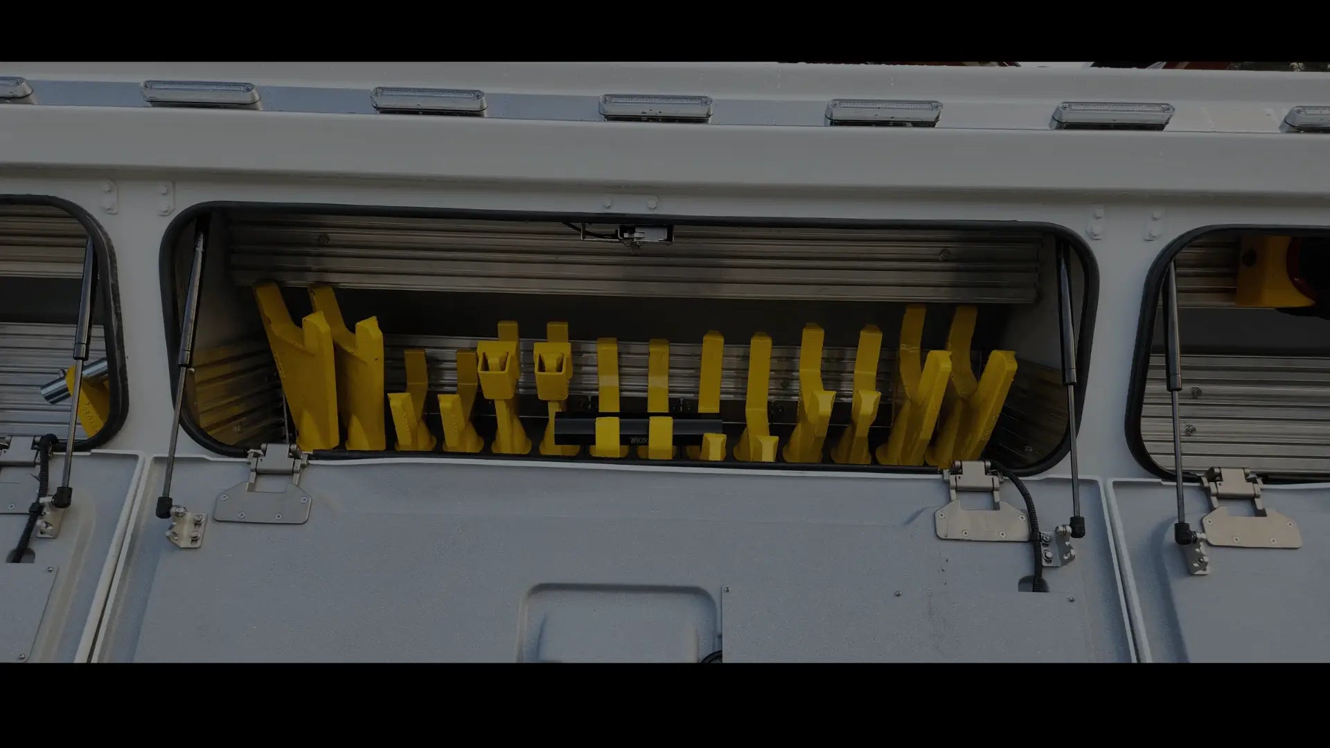 Axle forks in fork holders stored in a t