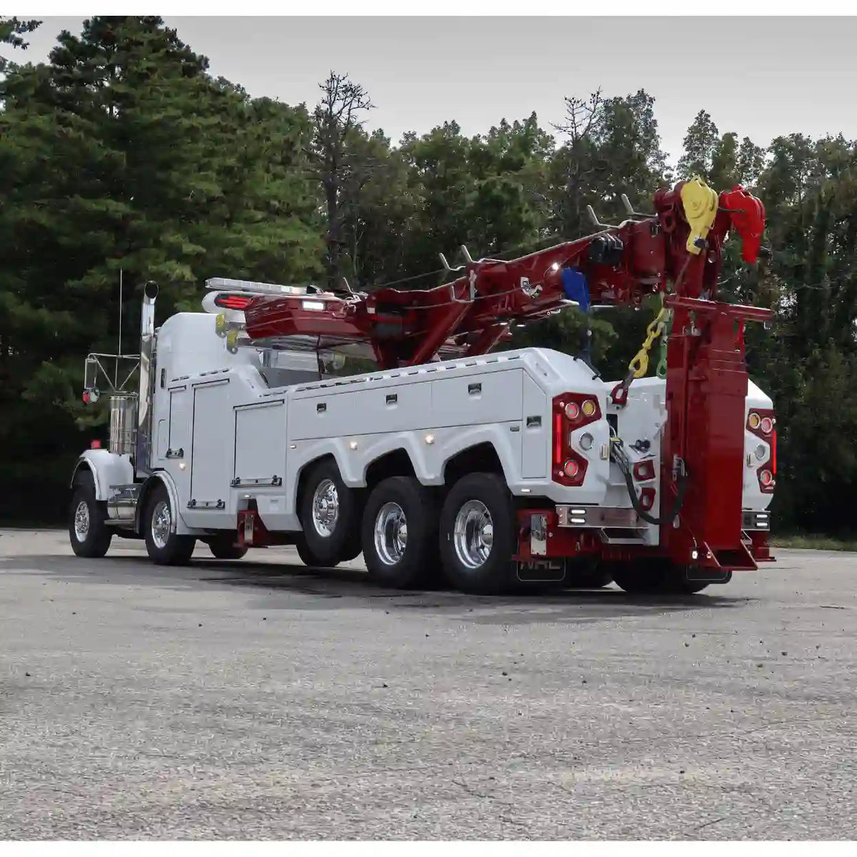 highlighting the boom and axle-lift of an NRC CSR65 heavy duty wrecker