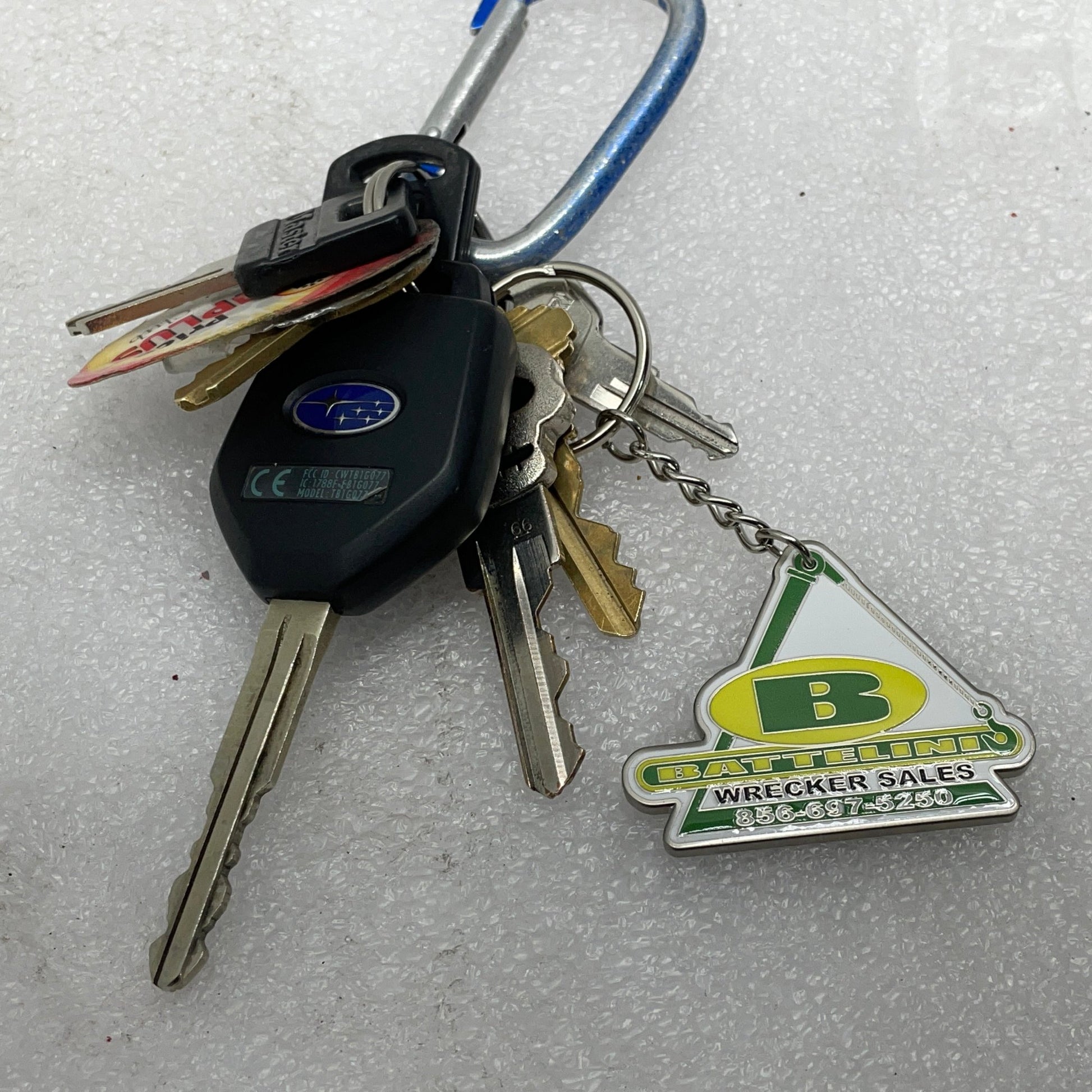 Keychain with battelini wrecker sales logo 