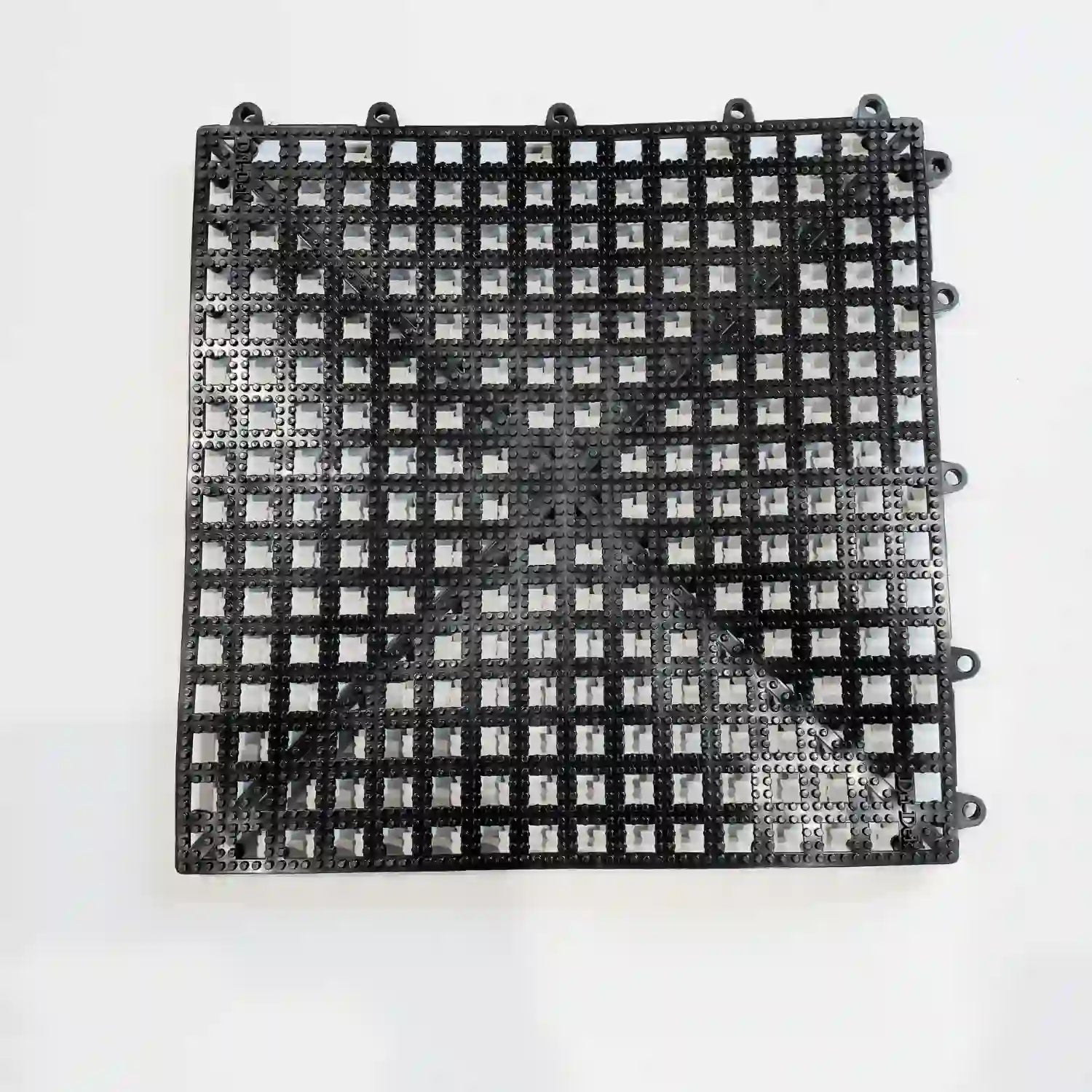 black dri-dek tile. used inside of truck toolboxes and top trays to protect toolboxes and provide drainage