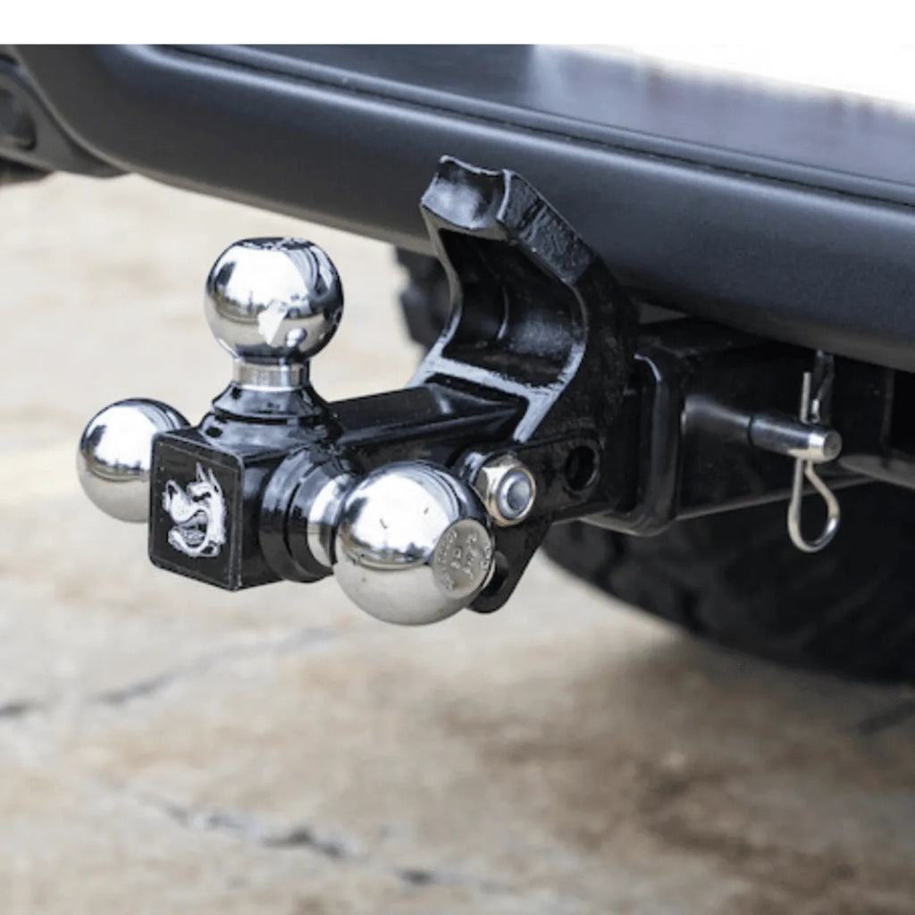 Heavy-duty Buyers tri-ball hitch with integrated pintle hook. Versatile 2.5-inch receiver mount.