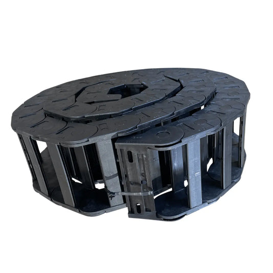 Cable e-chain used to organize and protect hydraulic and electrical lines so they don't get pinched or kinked while opening and closing the bed of a car carrier tow truck