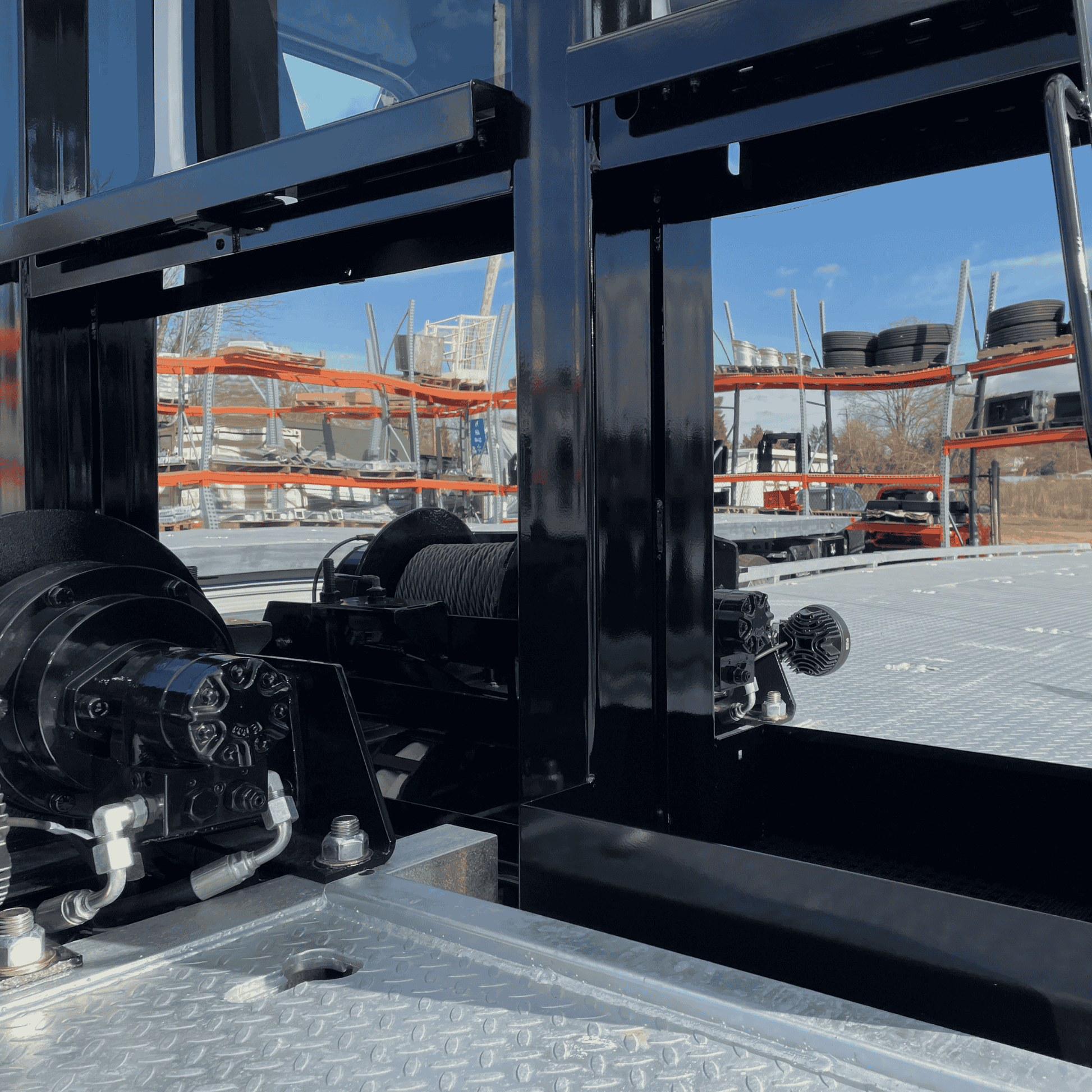 Polished stainless trim situated within the center of the chainrack, just behind the winch