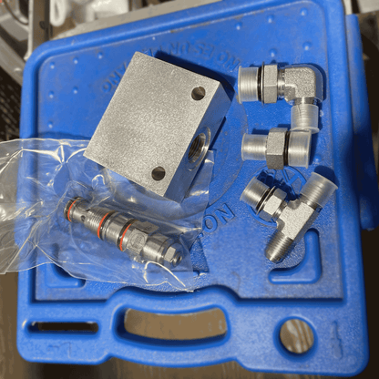 counterbalance valve kit for tow-bar up-down cylinders. This kit holds pressure and keeps the tow-bar from "drifting-down"