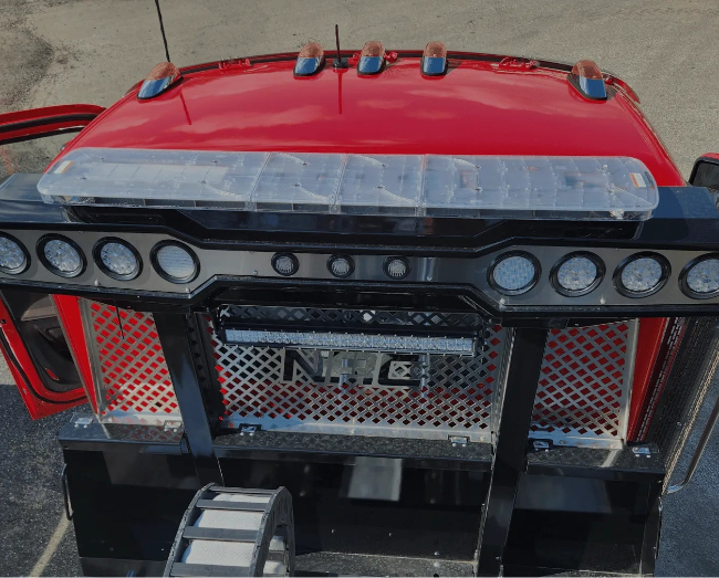 61" federal signal lightbar installed on chain rack of an nrc 20tb car carrier tow truck