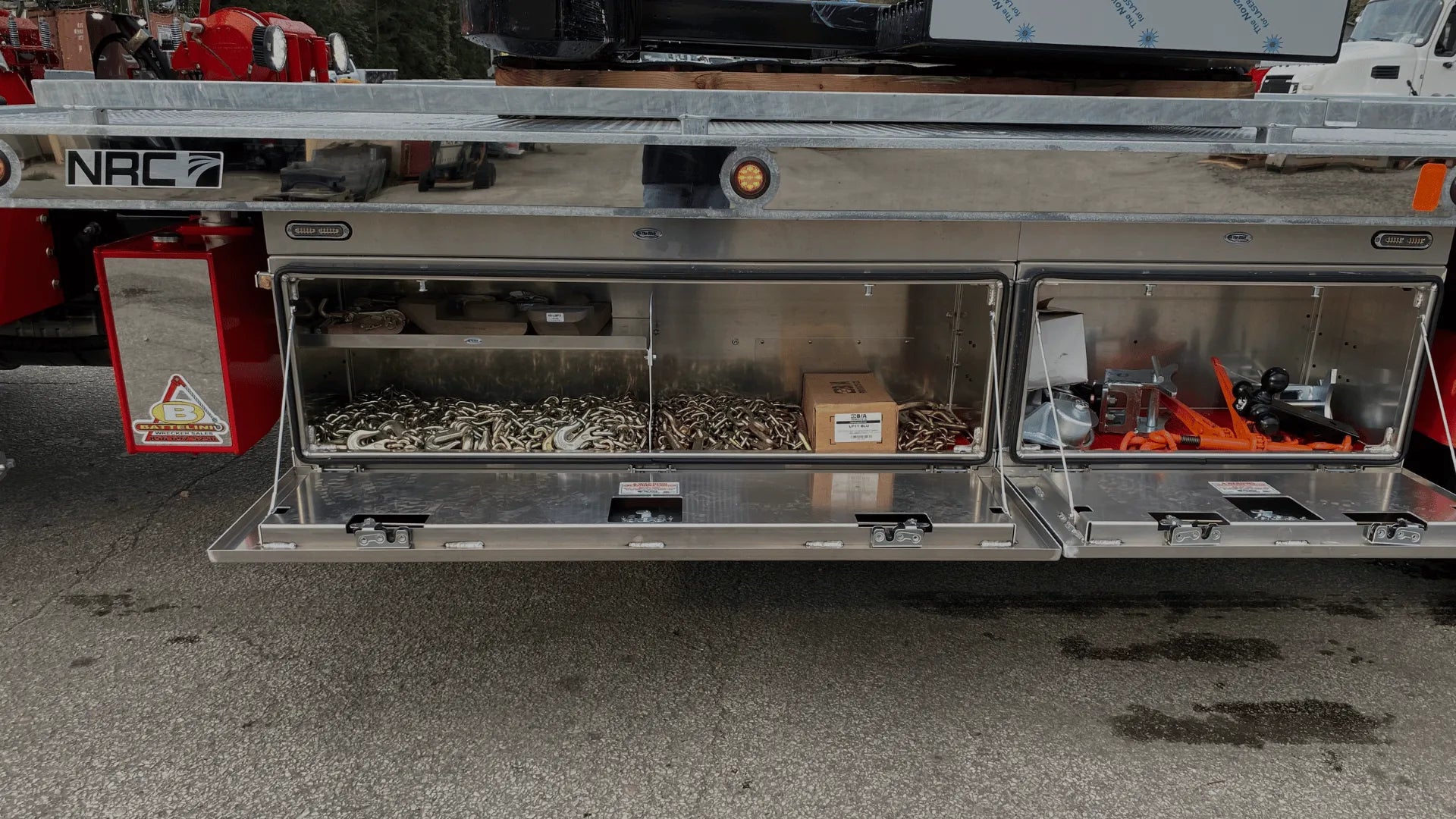 G70 chains, ratchet binders, and other towing equipment inside In the Ditch Pro Series underbody Toolboxes