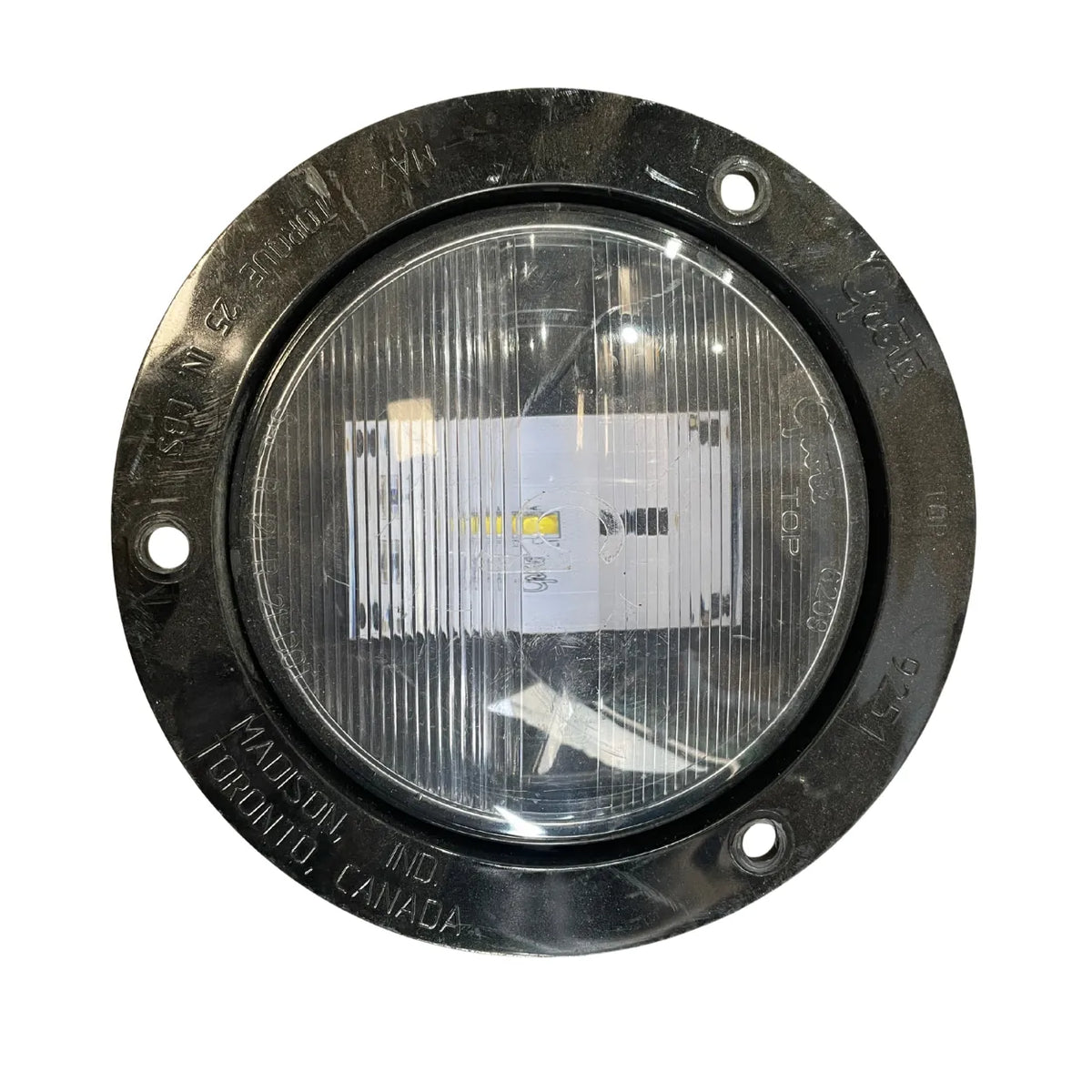 Grote 62091 SuperNova NexGen 4 inch LED back-up light, front view of clear lens with LED board and black flange