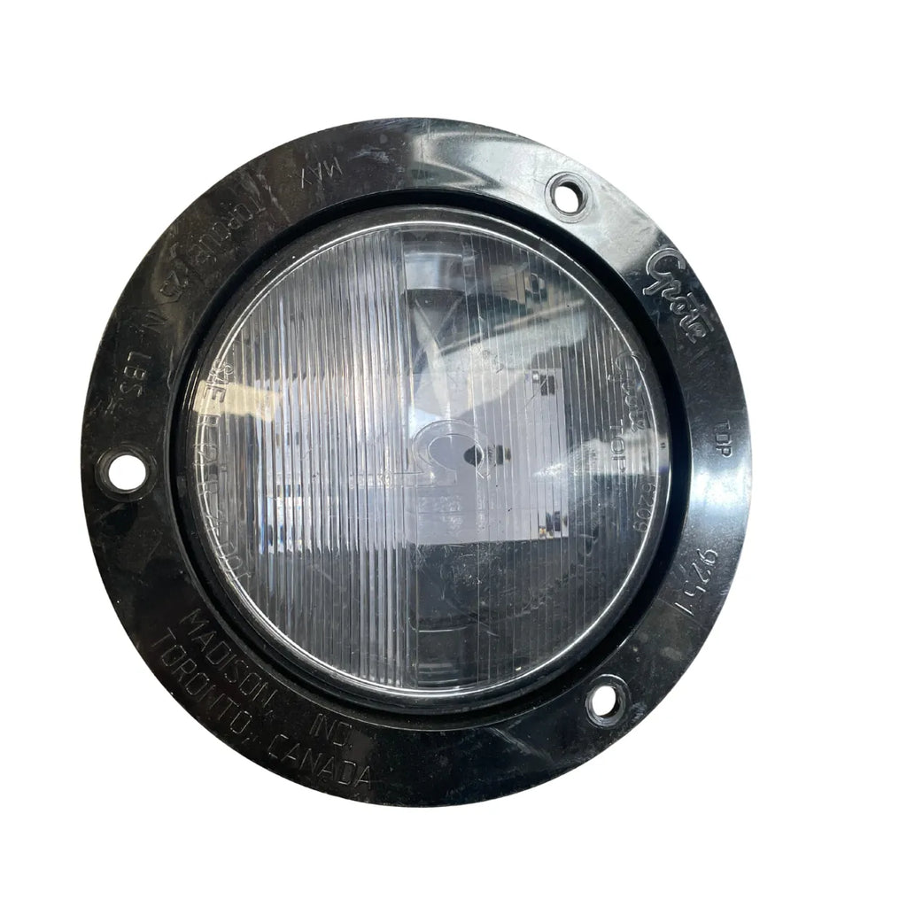 Grote 62091 4 inch LED back-up light with clear SAE R lens in black 3-hole screw-mount flange