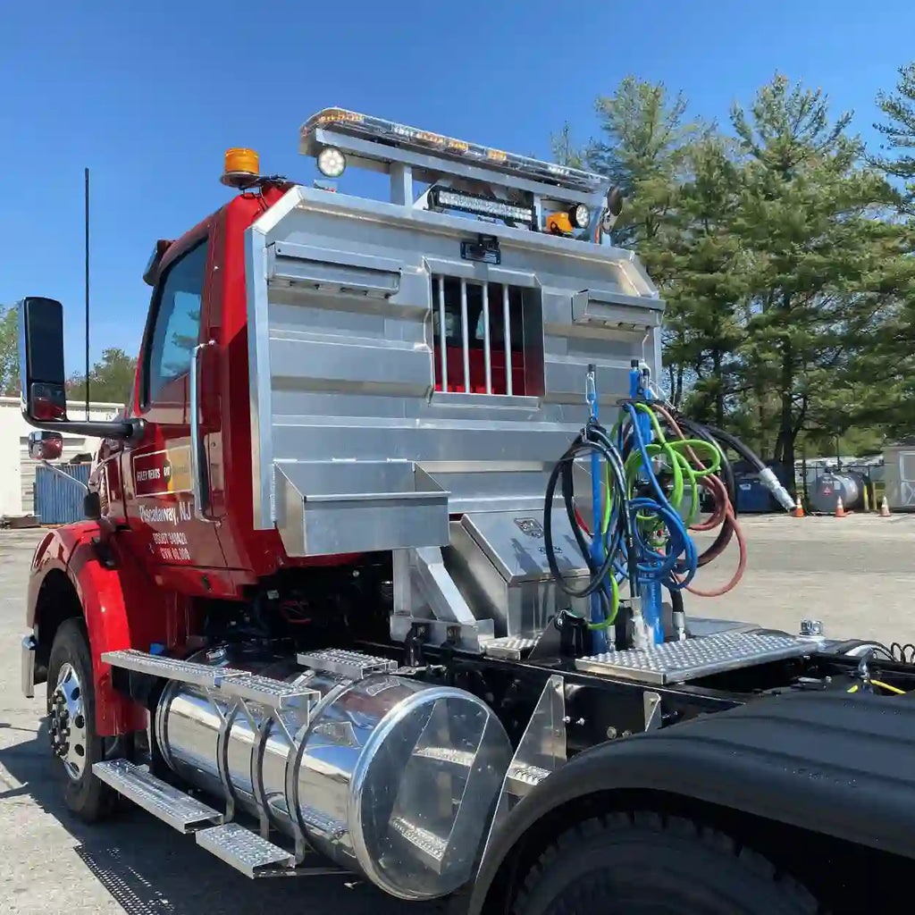 Iconic Aluminum Headache Rack with split trays and boot box installed on a tractor