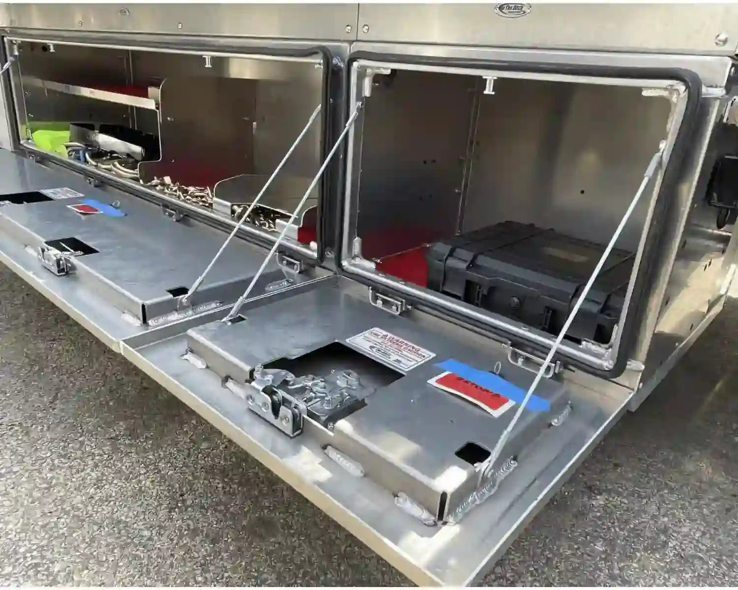 Premium toolboxes. In the ditch pro series underbody toolboxes with transport chain and other towing accessories inside