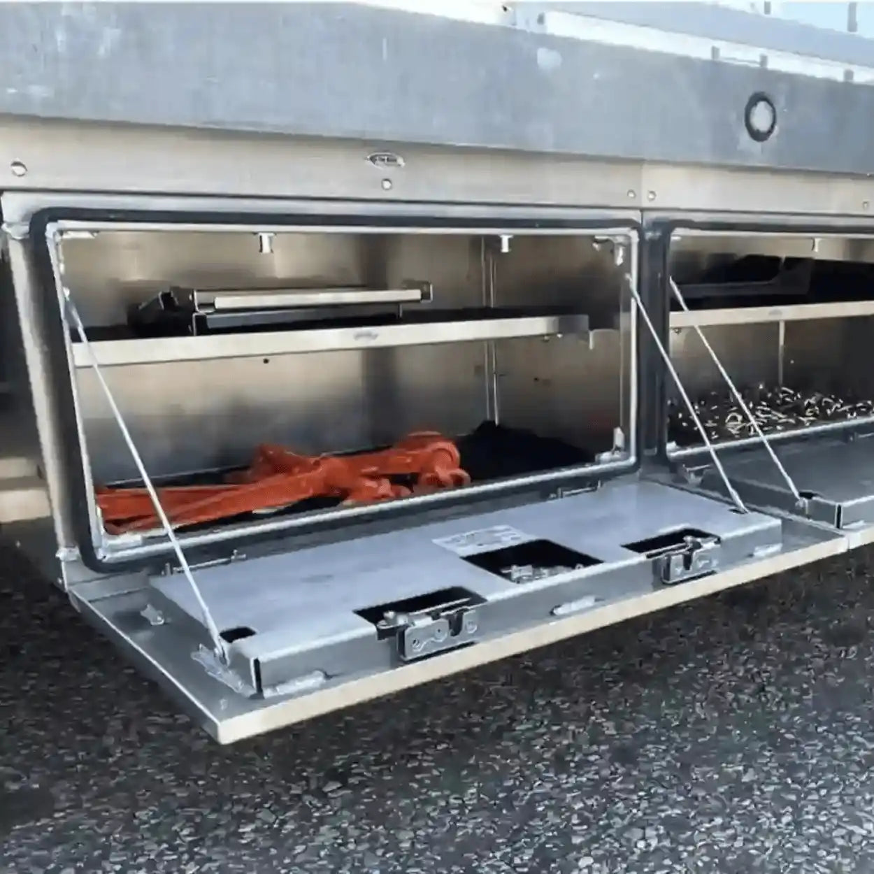 in the ditch pro series underbody tool boxes with 400 lbs. rated door and towing accessories. 36" and 70" toolboxes