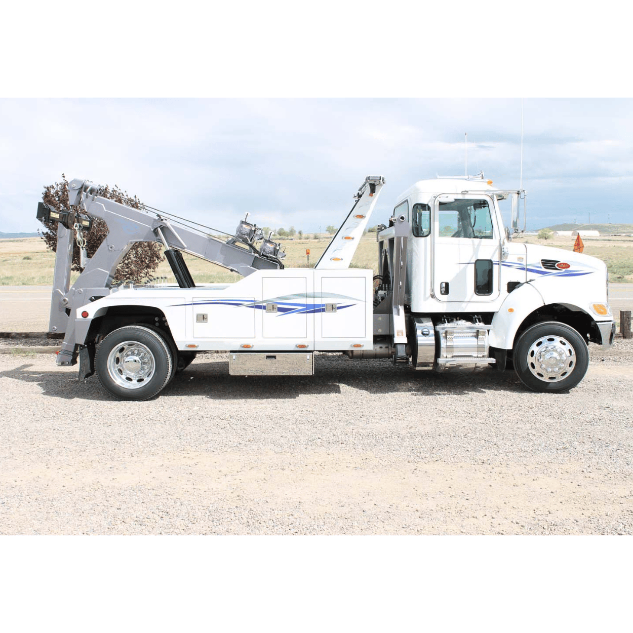 in the ditch drop down dolly storage box installed on a wrecker tow truck