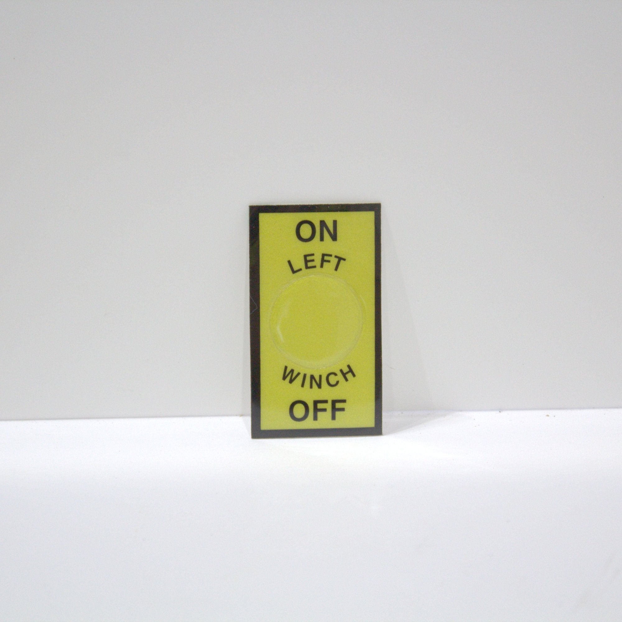 LEFT WINCH ON-OFF STICKER – Battelini Wrecker Sales