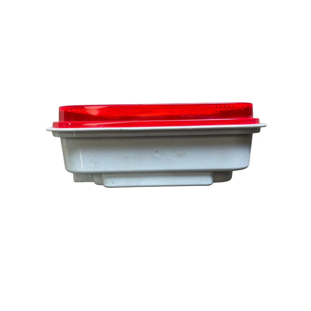 Side profile of Optronics BU33CRXLBP sealed back-up light showing 1-15/16 inch depth for grommet mounting