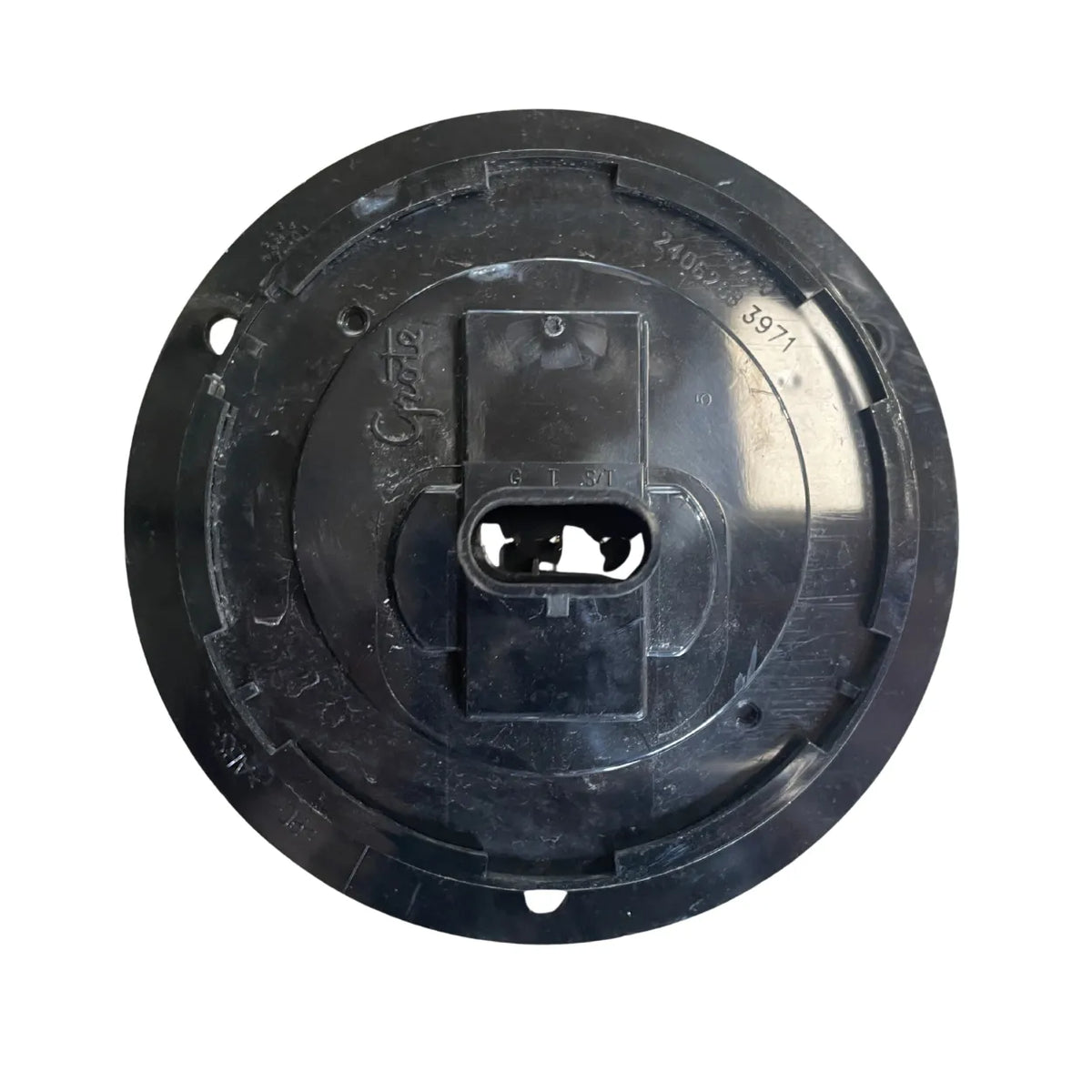 Rear of Grote 62091 LED back-up light showing male-pin connector labeled G, T and S/T