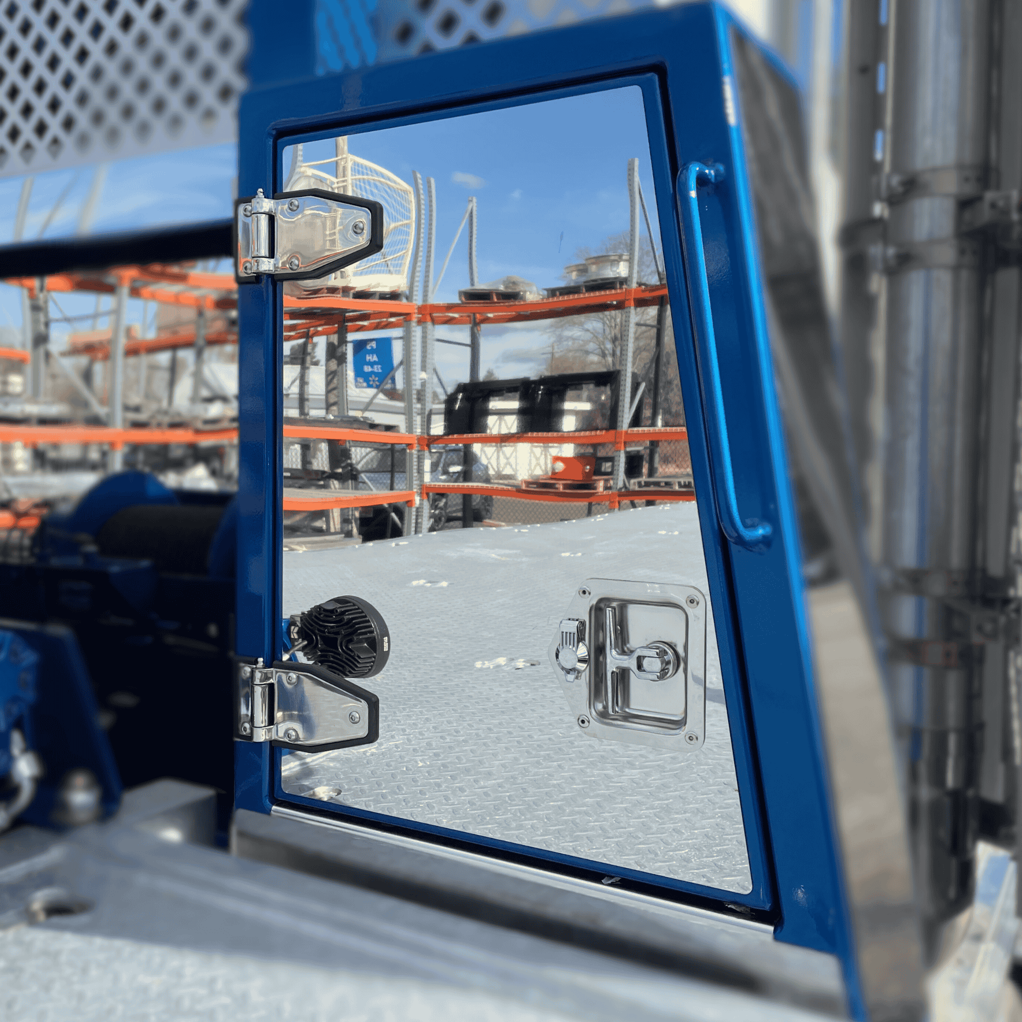 Polished stainless steel trim detail on the passenger side door of the chainrack toolbox
