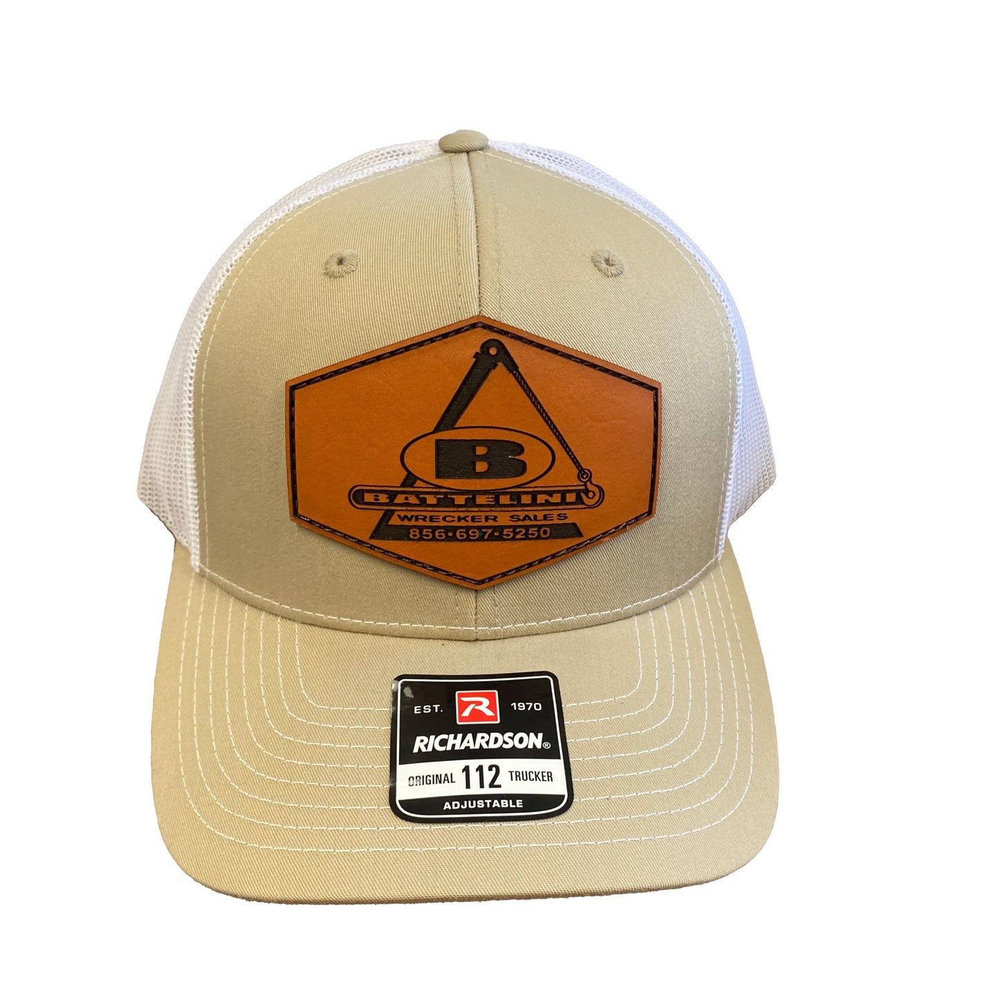Battelini trucker hat with sewn leather logo patch