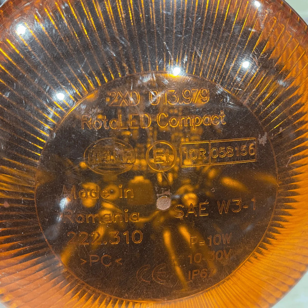 Fixed-mount amber warning light for utility trucks and service vehicles