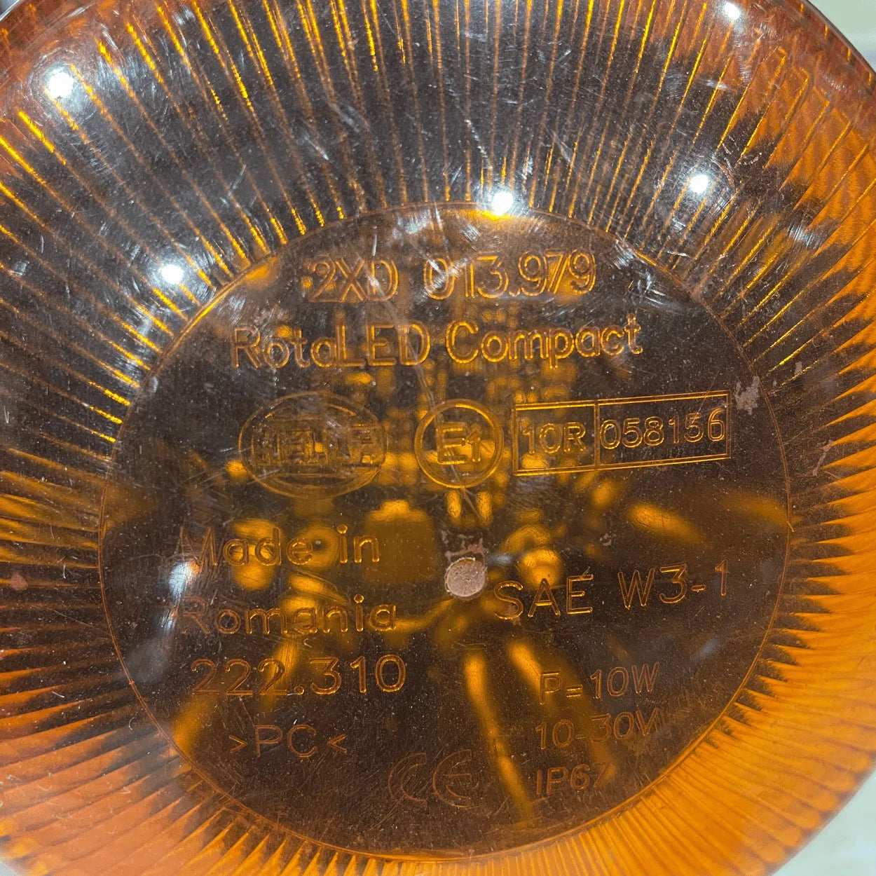 Fixed-mount amber warning light for utility trucks and service vehicles