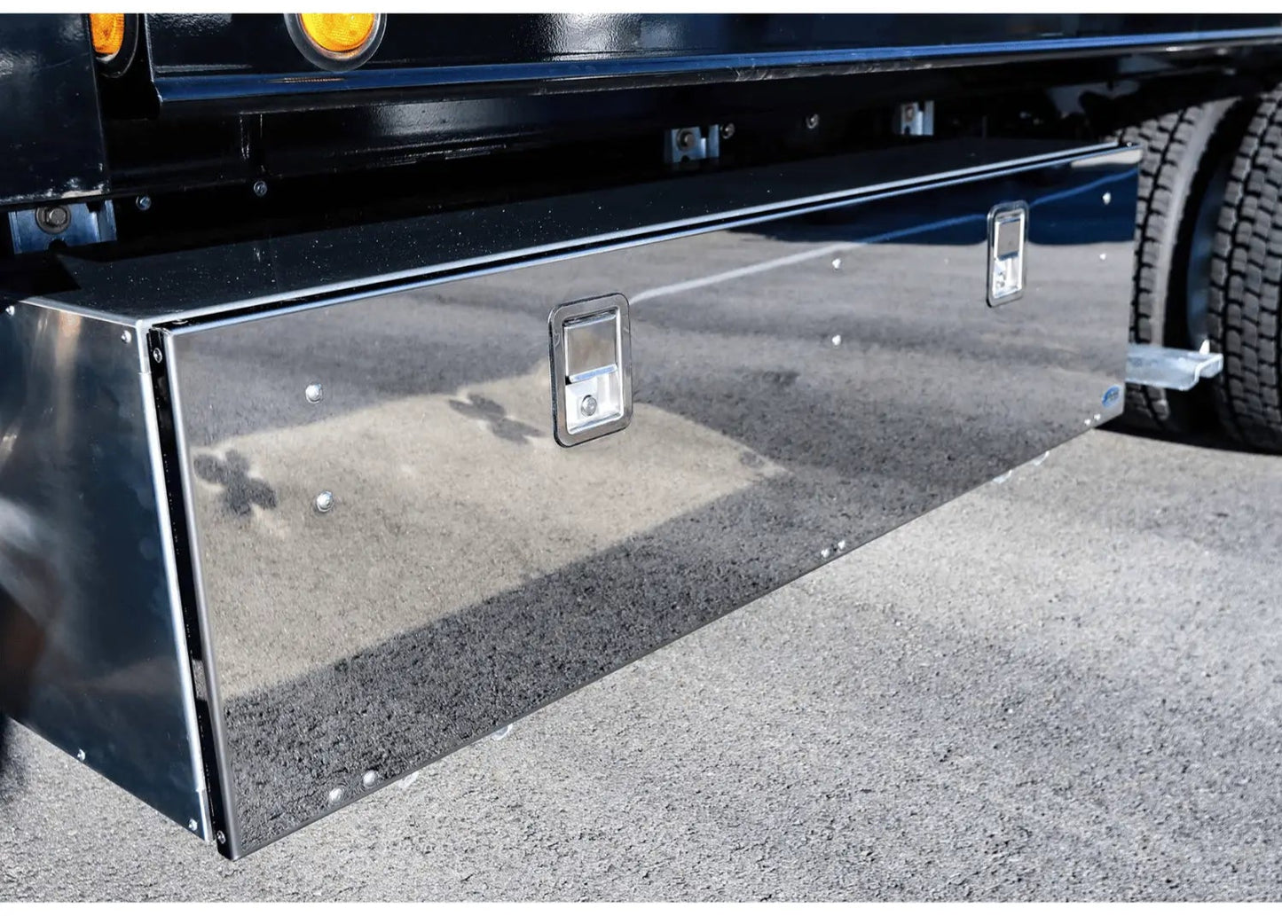 showcasing the mirror-finished door of a workman series truck toolbox