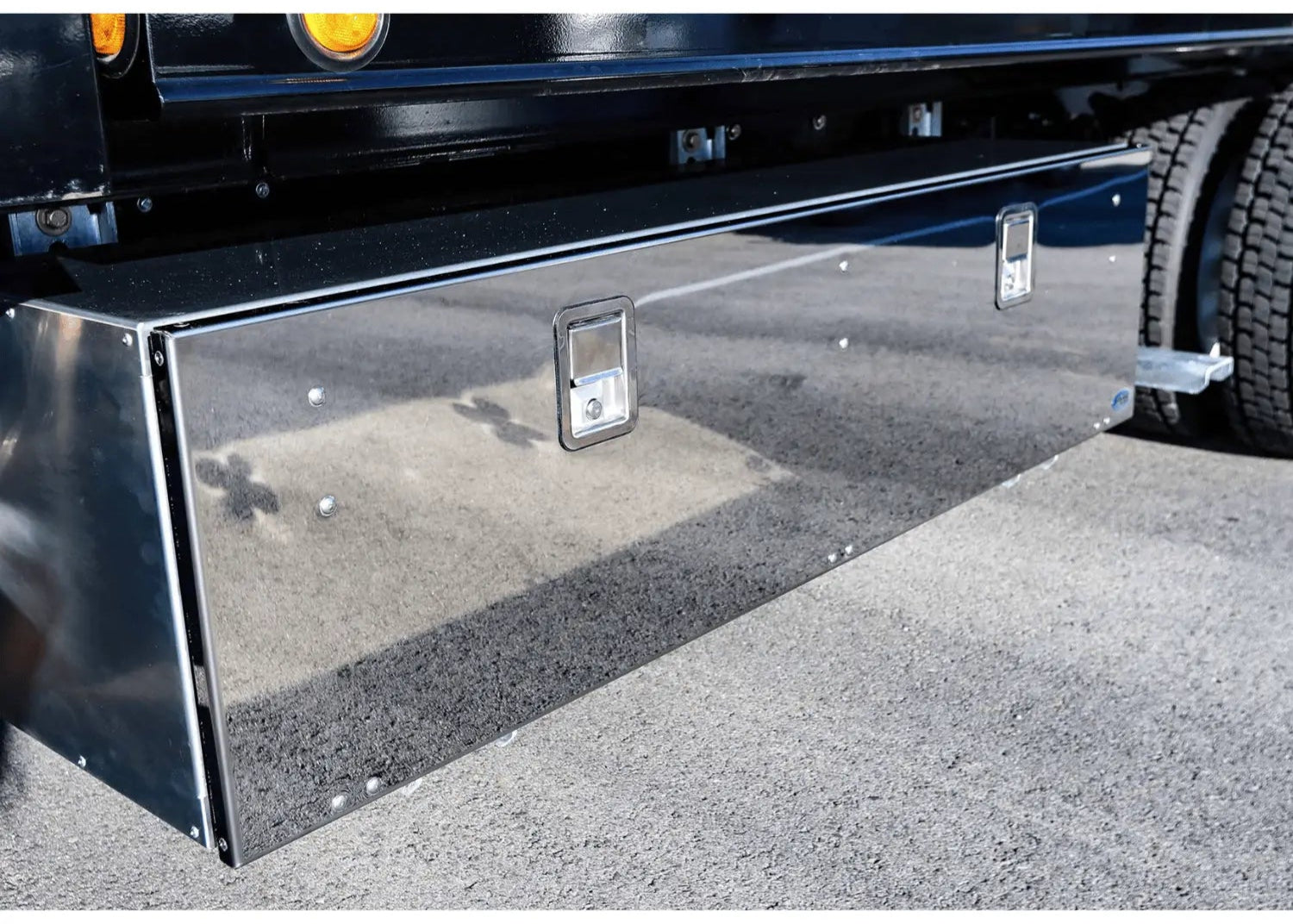 showcasing the mirror-finished door of a workman series truck toolbox